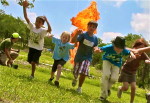 kids running from flame